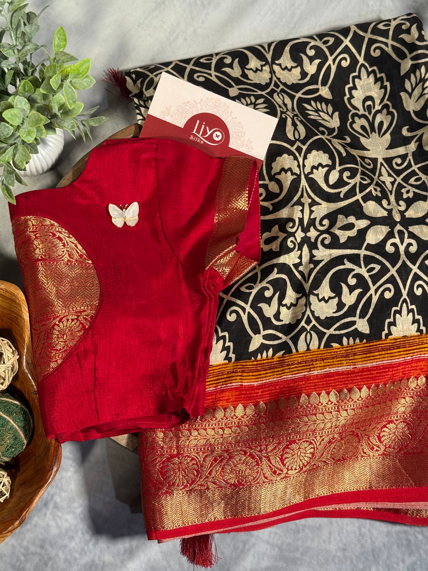 Classic White-Black Designer Dola Silk Saree with Bold Red Zari Border and Stitched Blouse