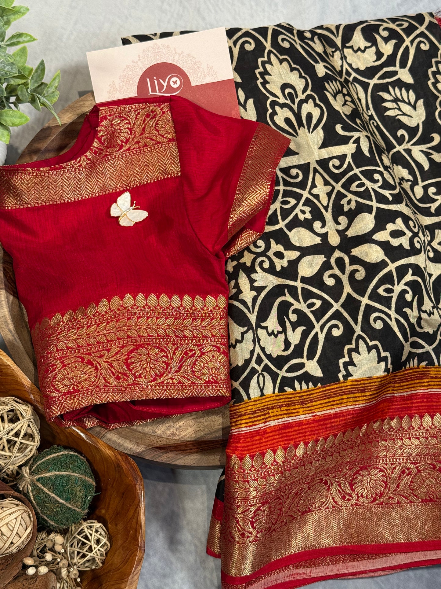 Classic White-Black Designer Dola Silk Saree with Bold Red Zari Border and Stitched Blouse