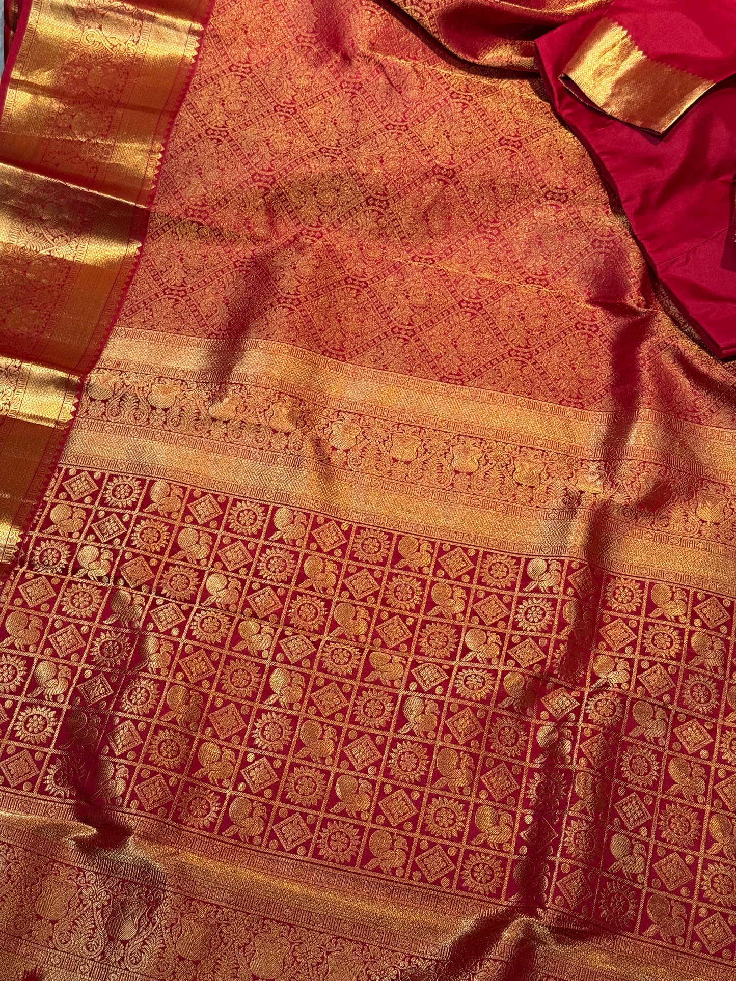 Maroon Kanjivaram Silk Saree with Intricate Zari Work and Stitched Blouse