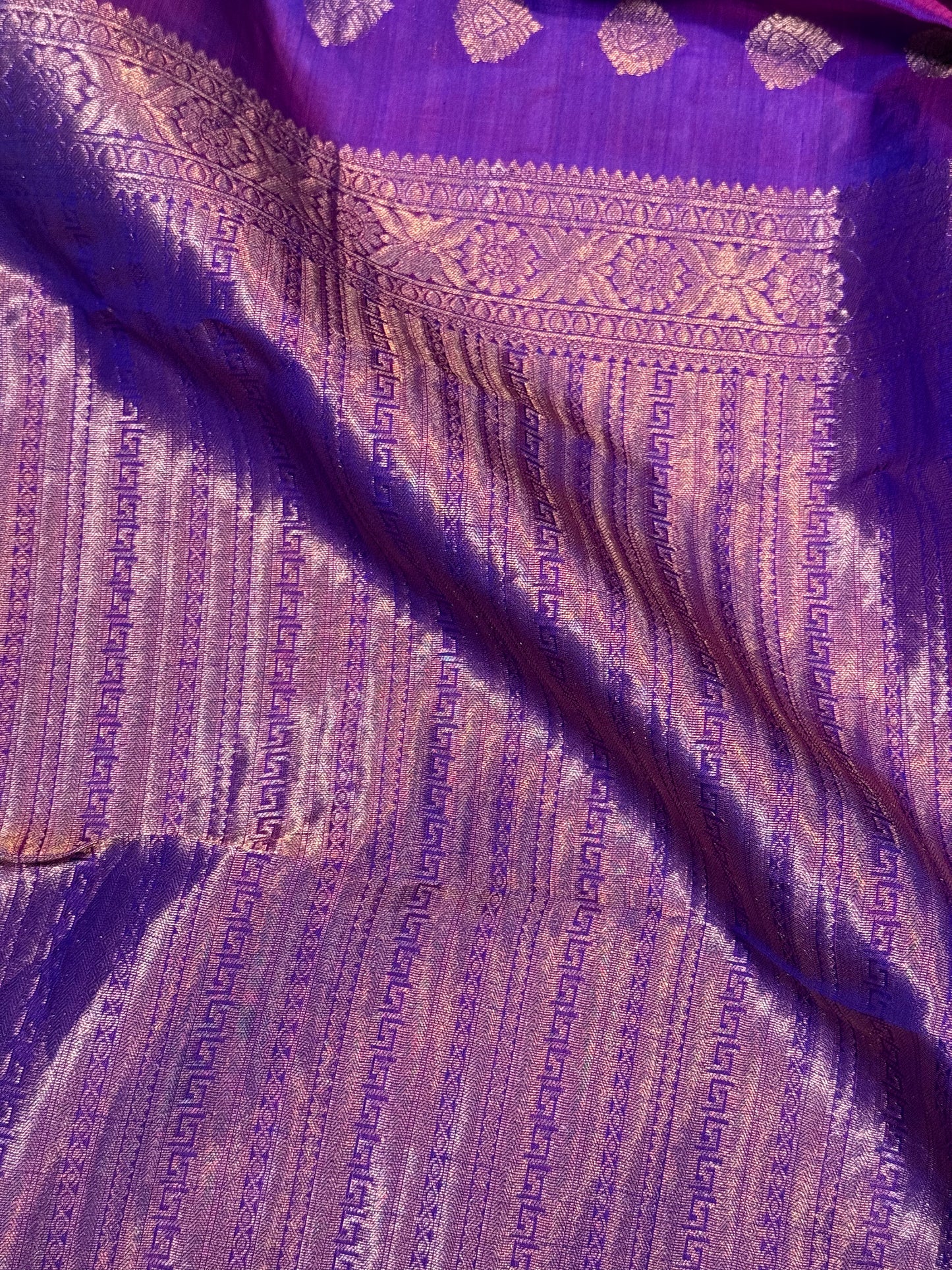 Purple Kanchipuram Silk Saree with Copper Zari Border & Pallu and Embroidered Stitched Blouse