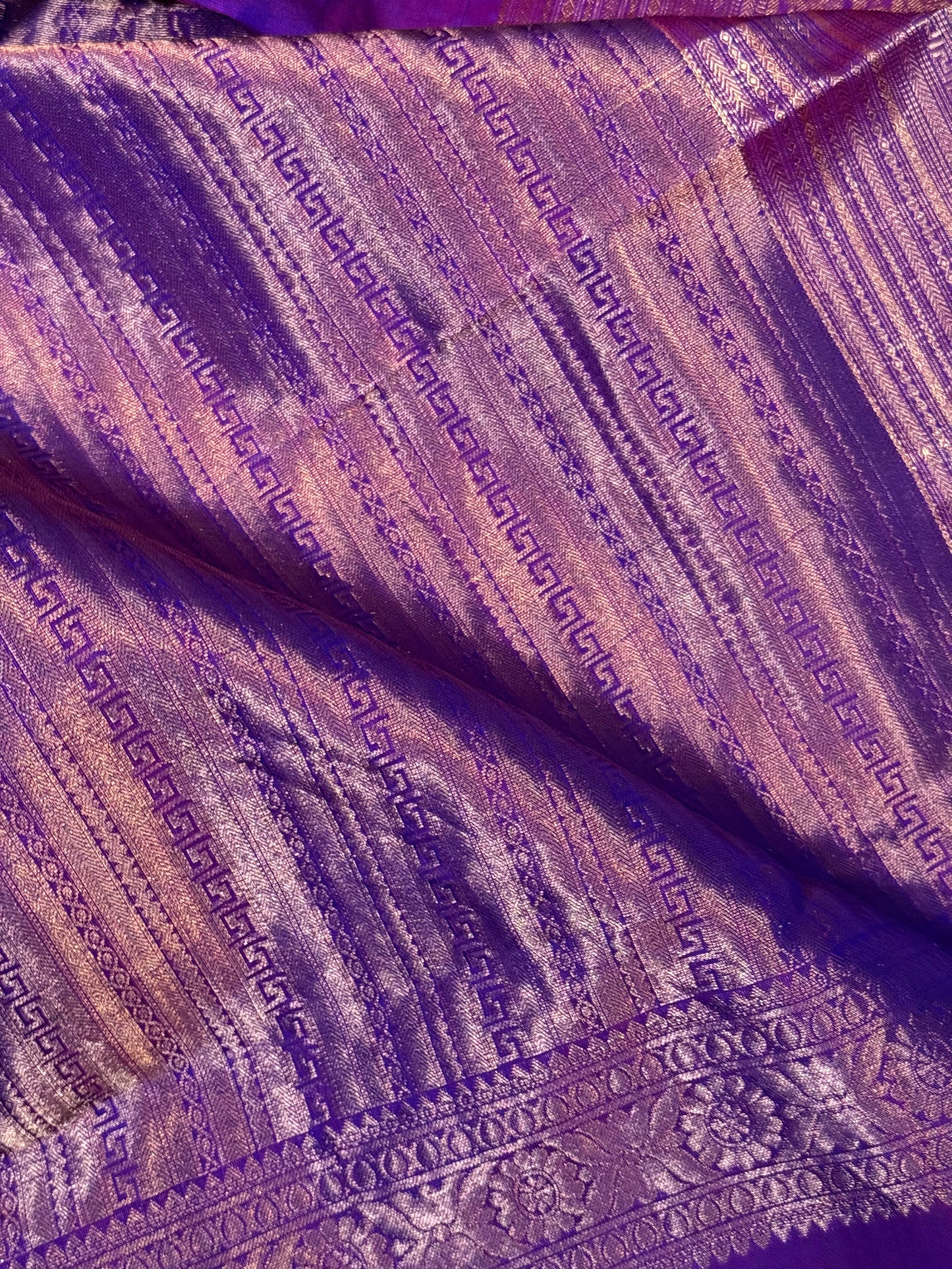 Purple Kanchipuram Silk Saree with Copper Zari Border & Pallu and Embroidered Stitched Blouse