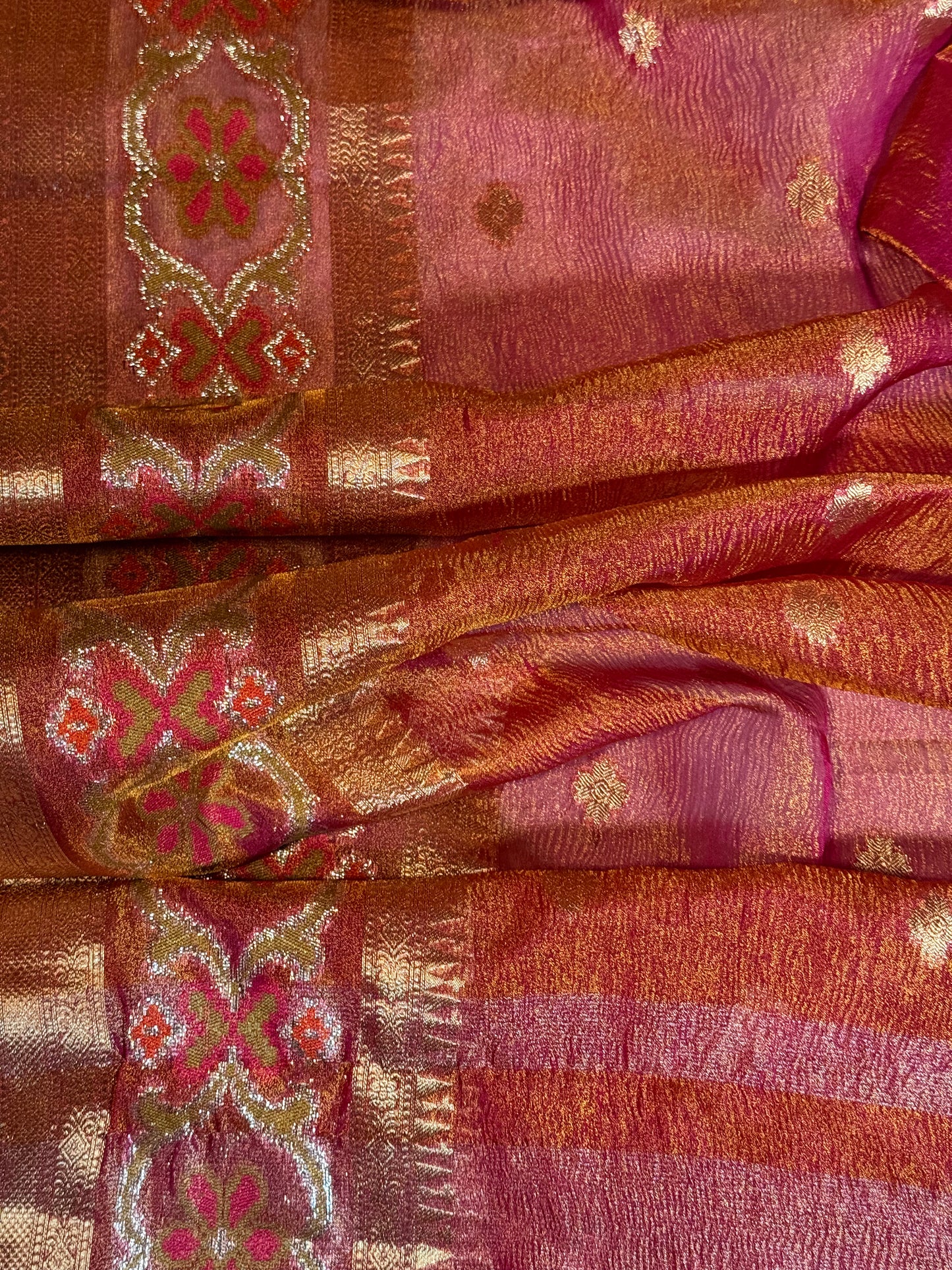 Crush Tissue Saree in Pinkish Orange with Ornate Border and Tailored Blouse