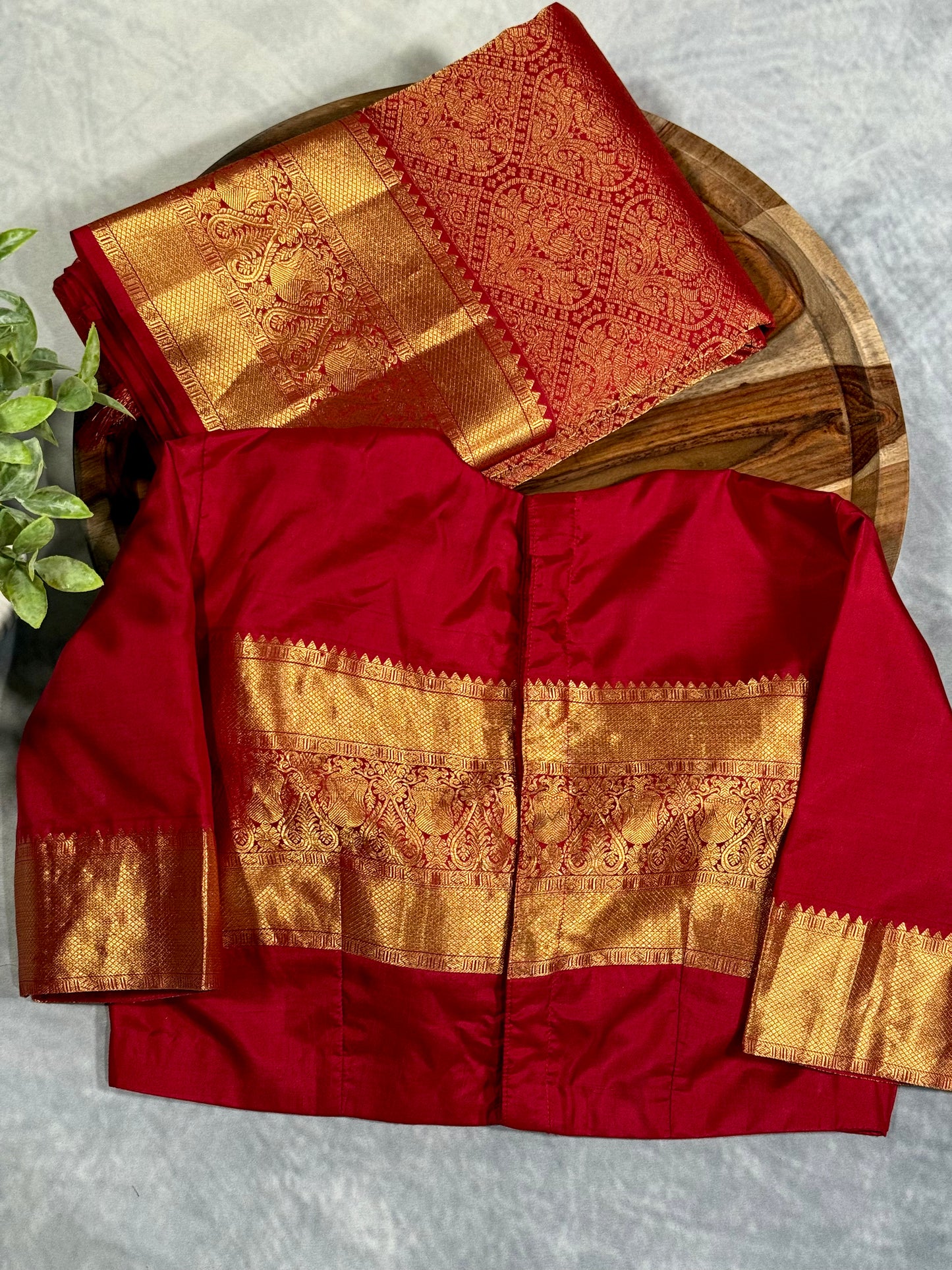 Maroon Kanjivaram Silk Saree with Intricate Zari Work and Stitched Blouse