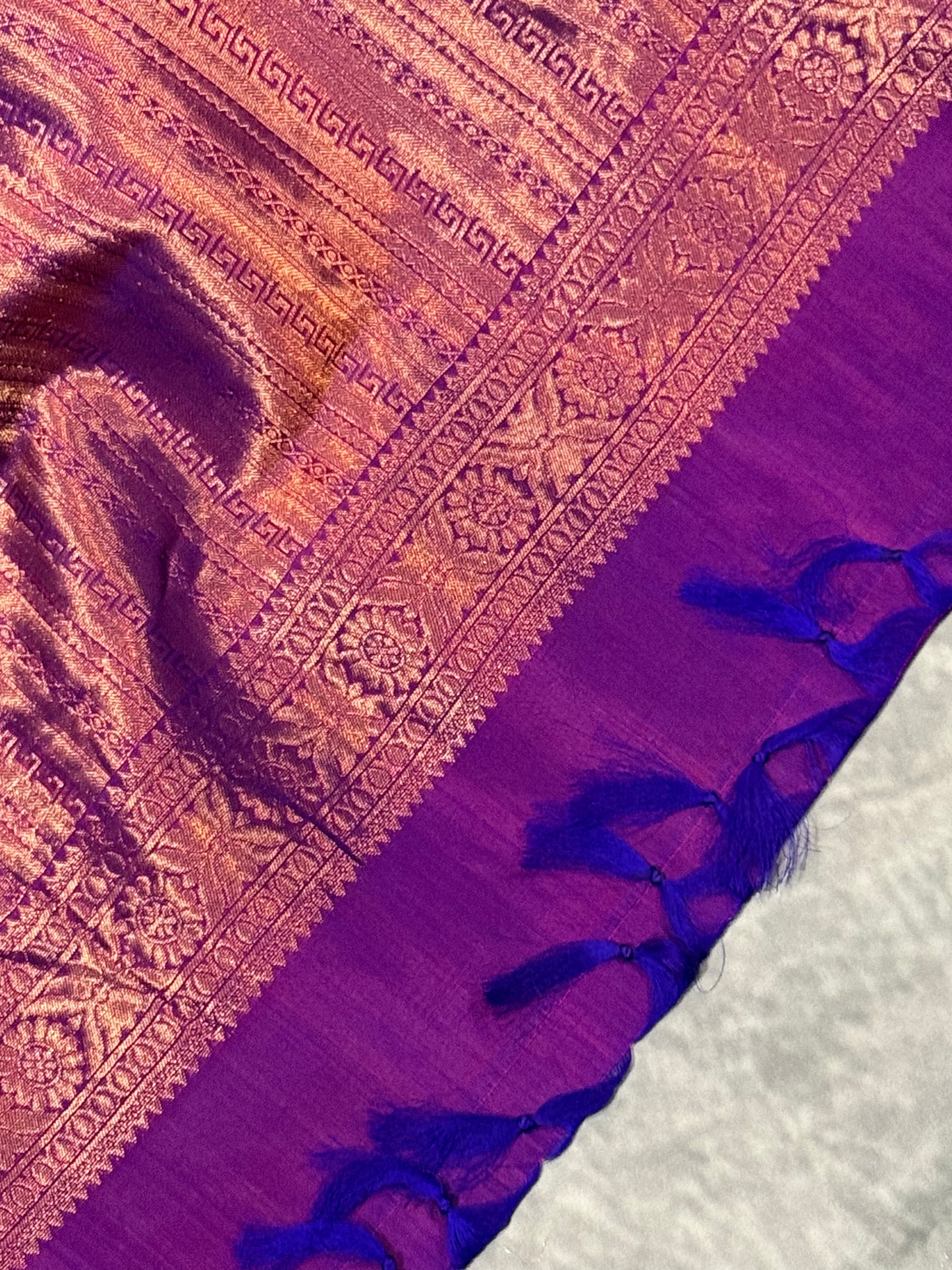 Purple Kanchipuram Silk Saree with Copper Zari Border & Pallu and Embroidered Stitched Blouse